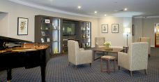 Arcare aged care sanctuary manors piano room 01